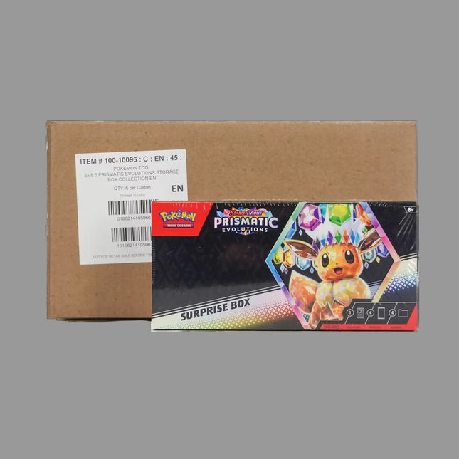 Cardboard box with a Prismatic Evolutions toy packaging featuring a cartoon character on a white background.